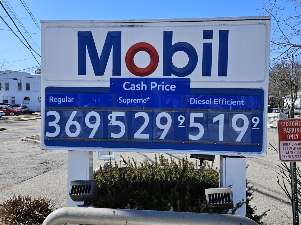 A picture of a Mobil gas sign where Regular is $3.69.9, Supreme+ is $5.29.9, and Diesal is $5.19.9.