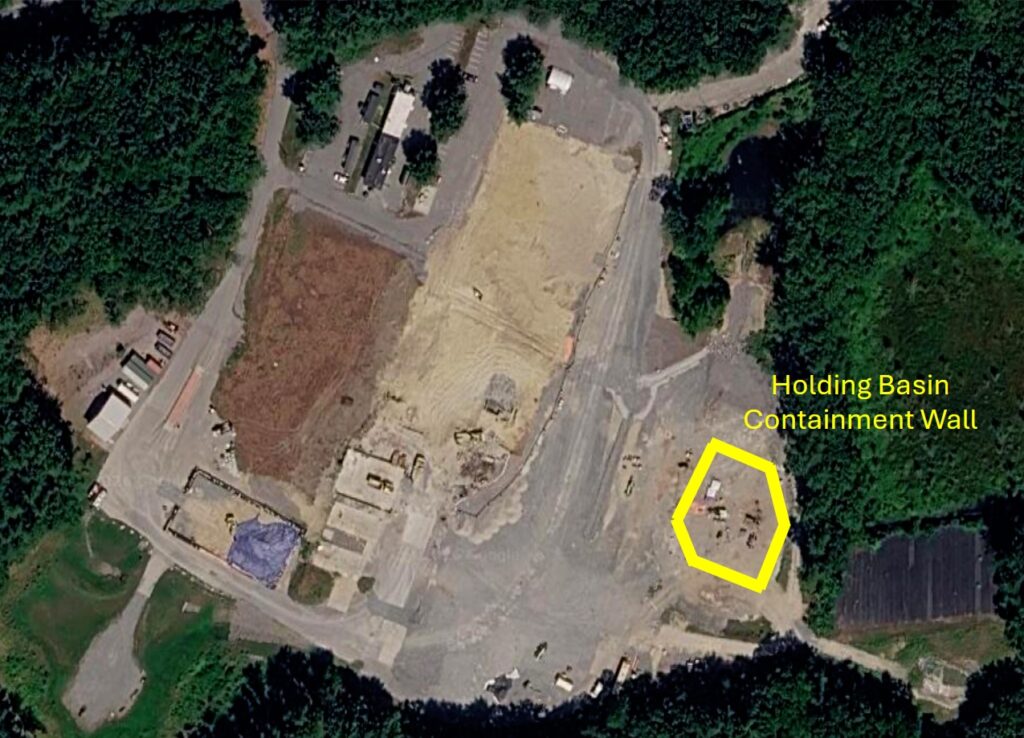 A close up map of the NMI site that shows where a containment wall will be built.