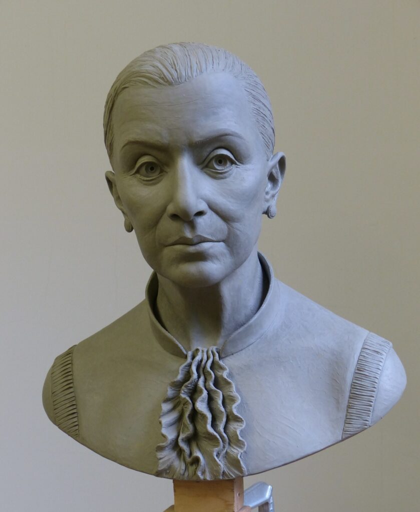 A bust of a younger Ruth Bader Ginsberg.