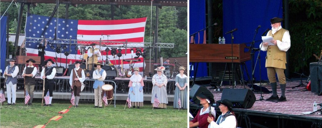 Mike Gowing on stage and eight members of Acton Minuteman stand in front of a stage at Nara Park in Acton in Revolution Era costumes.